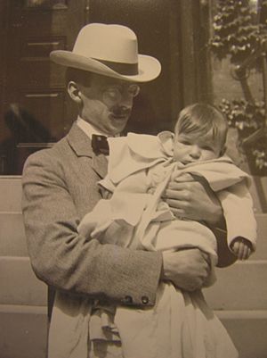 Gilbert H. Grosvenor holds his son, Melville Grosvenor