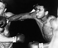 Muhammad Ali fights Brian London on August 6, 1966 (cropped)