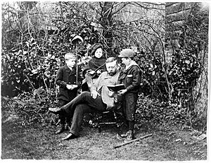 Photograph; Sir Thomas Barlow seated, with his three sons. Wellcome L0022408