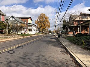 2022-11-01 12 57 28 View northeast along Broad Street at Main Street in Trumbauersville, Bucks County, Pennsylvania