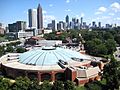 Alexander Memorial Coliseum IN THE FOREGROUND AND DOWNTOWN ATLANTA IN THE BACKGROUND