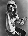 Janis Joplin seated 1970