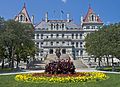 New York state capitol front view with flower bed