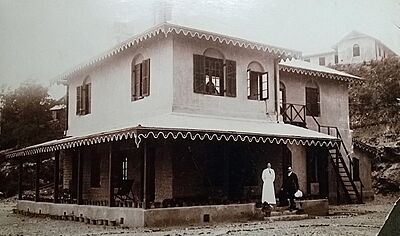 Aeneas Francon Williams on the steps of his residence, Wolseley House, at St. Andrew's Colonial Homes, Kalimpong, 1914