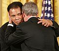 President George W. Bush Embraces Muhammad Ali