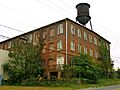 The Old Buggy Factory and Water Tower