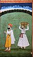 Guru Nanak with Bhai Lehna, who is getting dirtied by carrying weeds overhead