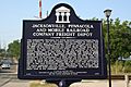 Jacksonville, Pensacola and Mobile Railroad Company Freight Depot historical marker (South face)