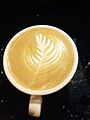 Latte art in the style of a feather