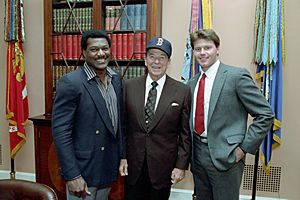 President Ronald Reagan posing with Roger Clemens and Don Baylor