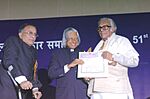 The President Dr. A.P.J. Abdul Kalam presenting the Dada Saheb Phalke Award for the year 2004 to the noted filmmaker Shri Mirinal Sen for outstanding contribution for the growth and development of Indian Cinema at the 51st.jpg