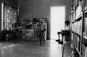 Young man reading in the McKinlay Library Queensland