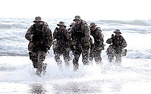 A Seal Team is coming out of water