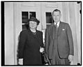 Confer with President Roosevelt. Washington, D.C., May 17. Secretary of Labor Frances Perkins and Dr. John R. Steelman, Chief of the mediation service, leaving the White House today after a LCCN2016875652