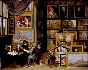 David Teniers II - A picture gallery with two men examining a seal and a red chalk drawing, and a monkey present