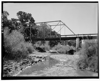 Downstream elevation of truss span, view to southwest along Red Bank Creek. - Red Bank Creek Bridge, Spanning Red Bank Creek at Rawson Road, Red Bluff, Tehama County, CA HAER CAL,52-REBLU.V,2-9.tif