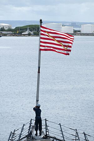 Flickr - Official U.S. Navy Imagery - A Sailor raises the Navy Jack.