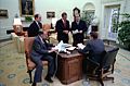 President Ronald Reagan holds an Oval Office staff meeting