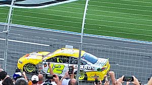 Ryan Blaney drives to the finish line in the opposite direction after winning the 2018 Bank of America 400
