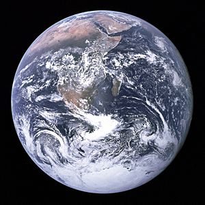 "The Blue Marble" photograph of Earth taken by the Apollo 17 mission. The Arabian peninsula, Africa and Madagascar lie in the upper half of the disc, whereas Antarctica is at the bottom.