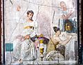 Wall painting - actor and two muses - Herculaneum (insula orientalis II - palaestra - room III) - Napoli MAN 9019