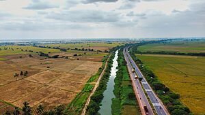 Aerial view of National Highway 16 and Eluru canal near Denduluru