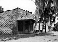 Brick building along commercial strip, November 1946