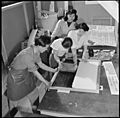 Heart Mountain Relocation Center, Heart Mountain, Wyoming. Members of the Poster Shop Staff at the . . . - NARA - 539255