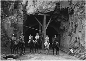 Horseback party at west entrance to Zion Tunnel. This tunnel will shorten the distance from Zion to Bryce by 70... - NARA - 520397