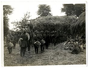 Indian Infantry Band 40th Pathans playing on a French farm (Photo 24-45)