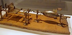Model funeral cortege, Peru, Chancay-Chimu, north central coast, c. 1400 AD, view 4, silvered copper, cotton, reeds, feathers - Krannert Art Museum, UIUC - DSC06453