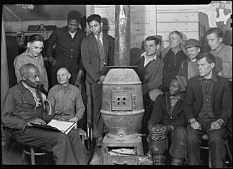 Scott's Run, West Virginia. Unemployed man attending meeting of the Workers Alliance Council - All of the men are... - NARA - 518383