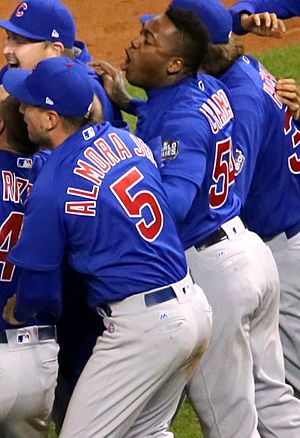 The Cubs celebrate after winning the 2016 World Series. (30658637601) (cropped)