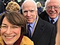 Amy Klobuchar selfie with Senators McCain and Sanders during 2017 inauguration C2oYpO6XcAArD5E