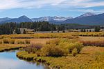 A photo of a stream and mountains in Beaverhead–Deerlodge National Forest.