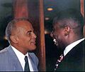 Harry Belafonte (left) with opera star Stacey Robinson in 1988