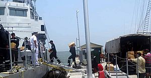 Medical supplies being disembarked from Naval Ship at Kollam