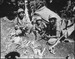 Navajo Indian communication men with the Marines on Saipan landed with the first assault waves to his the beach. - NARA - 532526.tif