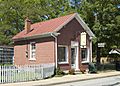 Photograph of a Small Brick Store on Main Street in Ste Genevieve MO