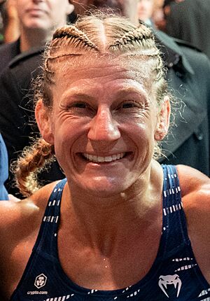 President Donald Trump congratulates Kayla Harrison after her victory during UFC 316 (54577590491) (cropped).jpg