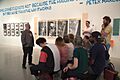 Students visiting Martha Rosler's show with Gregory Sholette
