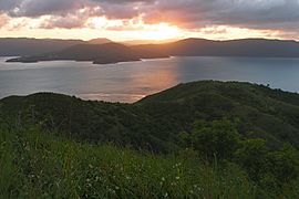 A206, Whitsunday Islands National Park, Australia, sunset over mainland from summit of South Molle Island, 2007