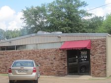 Grayson Barbeque in Clarence, with a smokehouse, draws clientele from beyond the village because of its regional reputation and location on U.S. Highway 71 near the intersection with U.S. Highway 84.