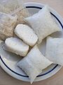 Lontong perforated plastic packets in NL