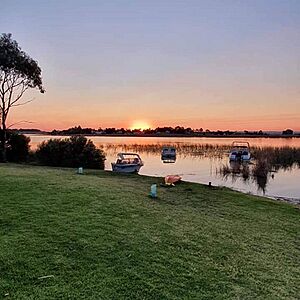 Reed clearing and power boats, Ramsar Wetlands Area, Clayton Bay Caravan Park