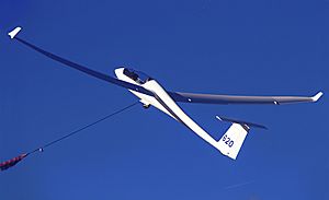 Schempp-Hirth Ventus 2b glider being launched at Lasham Airfield in UK