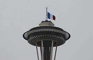 Space Needle flying the French flag at half-mast (22927150220)