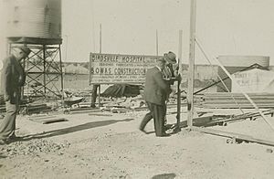 StateLibQld 2 249485 Governor Sir John Lavarack at the start of the construction of the Birdsville Hospital
