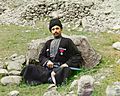 Sunni Muslim man wearing traditional dress and headgear