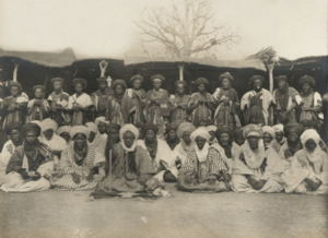 The Emir of Katsena, Magagin on his right and district headmen, police in the background